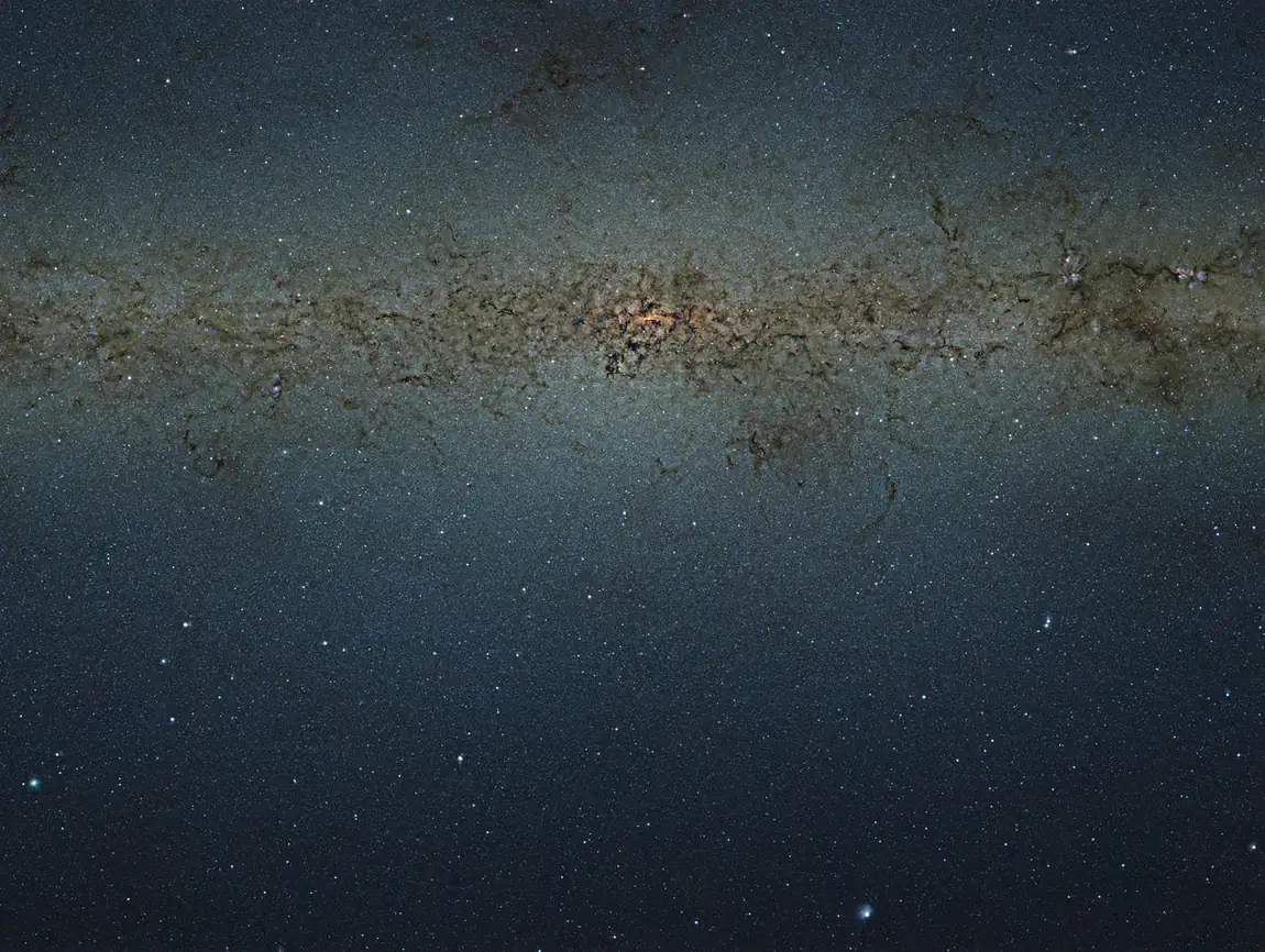 Mosaique infrarouge des parties centrales de la Voie lactee, ou des etoiles apparaissent a travers la poussiere.